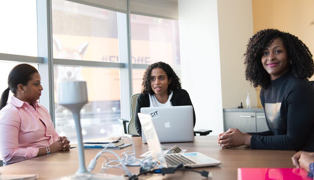 Women having a meeting in an office setting