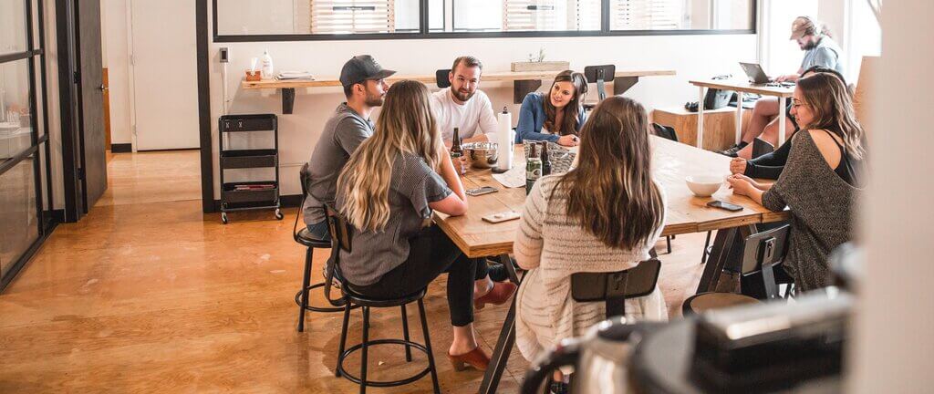 Group of people engaged in a meeting discussion